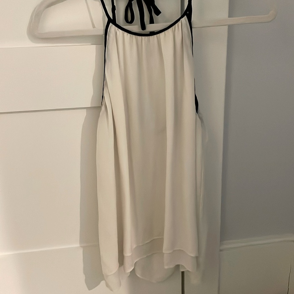 100% silk top. Great used condition.